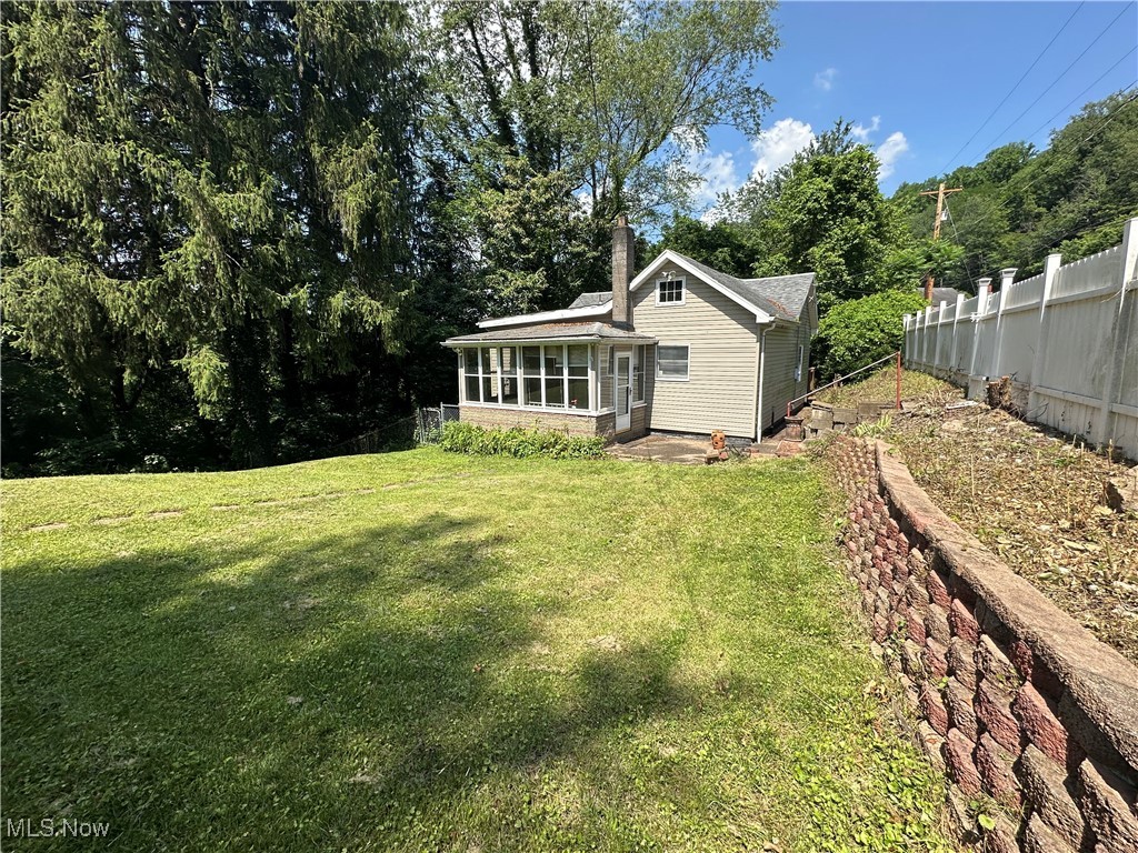 Cozy 2-Bedroom home in Short Creek, WV! Tucked away at the end of the street, this 2 bed, 1 bath home offers a nice mix of updates, comfort and privacy. The main level holds both bedrooms, including an oversized master with new windows, and a remodeled kitchen (2024) that features new countertops, cabinets, flooring and lights. Updated Pella doors open to a large composite deck area. Coupled with the partial privacy fence and ample yard space, this home is great for enjoying the outdoors in a peaceful setting. The bathroom and carpet throughout the main level were redone about 7 years ago. Roof is 10–15 years old. This home is perfect for a first-time home buyer, investment property, or someone looking to live the quiet, simple life. Located just minutes from highway access. Call an agent to schedule a private showing now!