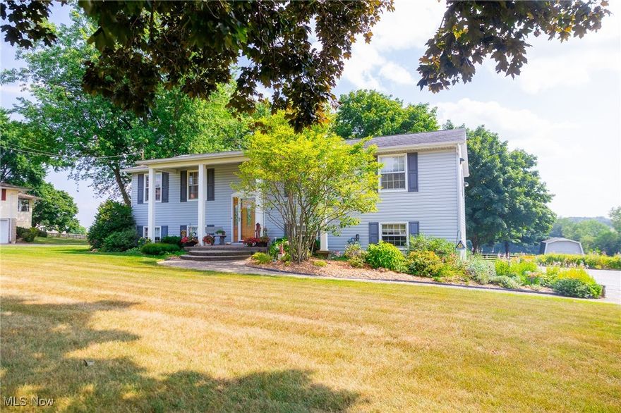 Set on 0.69 acres along a quiet street in Kidron, Ohio, this raised ranch combines country views with the convenience of being close to town, and it’s located in the Dalton Local School District. Thoughtfully maintained by its owners, the home offers 4 bedrooms, 3 bathrooms, and a layout designed for comfortable family living.

The exterior was fully updated in 2010 with a new roof, siding, and poly deck that overlooks the backyard. The driveway has fresh limestone with plenty of parking space for guests. An attached, heated, and insulated 2-car garage includes cabinetry for storage and a workbench. Recent mechanical updates include a natural gas water heater (2021), a new well pump (2022), and a private well with water softener and pH conditioner. The home is served by natural gas forced-air heat and central air.

Inside, the main level features a spacious living room, dining room with patio doors to the deck, and a functional kitchen with abundant cabinetry, pull-outs, and a breakfast nook overlooking the backyard (nook furniture can transfer with the sale). The master suite offers its own bathroom, while two additional bedrooms share a hall bath.

The lower level includes a large family room, laundry, a fourth bedroom, and a third full bathroom, along with direct access to the garage. Abundant closet and storage space can be found throughout the home.

This property offers a great opportunity to purchase a well-cared-for home in a desirable location.