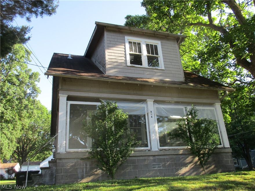 This property has 3 Lots, 2 on Munroe Falls Ave. zoned MU-2, and 3rd on Schubert zoned residential. 
Home needs completely remodeled. . or tear down and build 3 new homes or Apartment or business.
Vacant easy to show.

Home can be purchased separate for $55,000  Call agent for details..