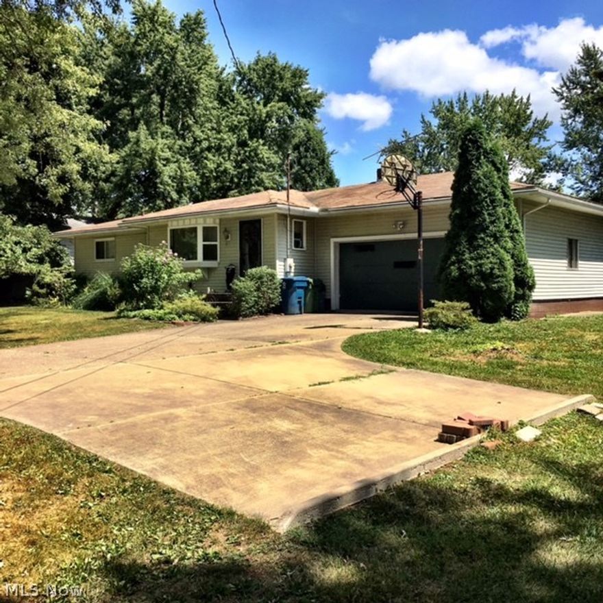 Welcome to 61 Maca Dr. in Tallmadge. Enjoy first floor living in the 3 bedroom Ranch with a beautiful 20x20 four season Sun room with gas fireplace and A/C. This sun room has a block foundation, full sliding windows, door and skylights to enjoy the full natural light. The large eat-in-kitchen is sure to please with plenty of cabinets, counter space and plenty of floor space for island if desired. The lower level is partially finished with additional bedroom if needed and spacious unfinished storage area. Outside enjoy the large yard and storage shed, 14x8 storage/workshop built on back of garage. Plenty of storage at this home throughout. Call today for your private showing.