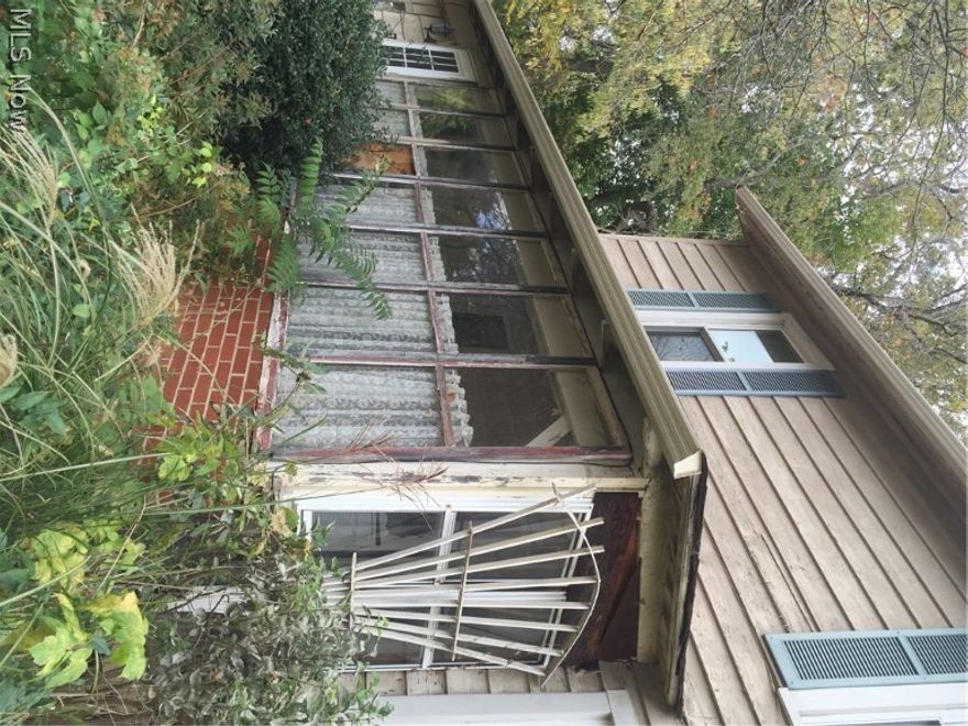 3 Bedroom 1 bath home on a spacious lot.  This home is a fixer upper that could be a great opportunity for a home owner or investor.  The bathroom has recently been updated/remodeled and looks great!  The attached garage has been converted into a living space/workshop with a wood burning stove.  Most of the windows have been replaced.  There is an enclosed porch.  This home is being sold as is.  Priced to sell​​‌​​​​‌​‌​​​‌‌​​​‌‌‌​​‌​​‌‌​​​​ fast!