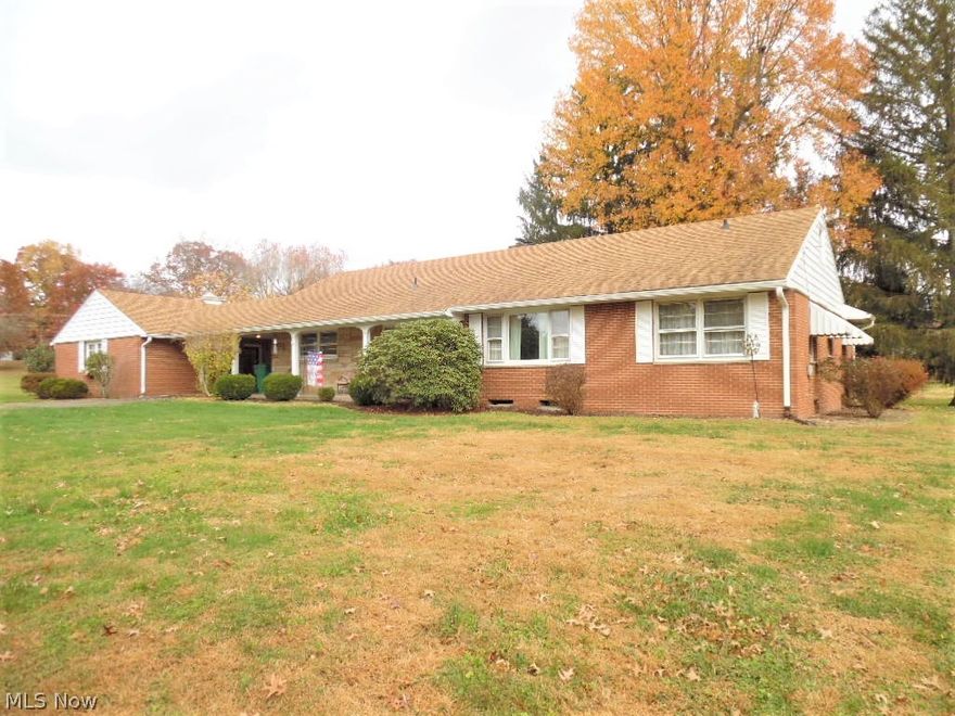 This Devola brick ranch is situated on over a half acre that is practically level.  Add your own updates to this solid mid-century home to make it your own.  The spacious kitchen and dining room combination that leads into the large living room with fireplace warmth will be your space for gathering.  The office could possibly be used as a 3rd bedroom.  There are cedar lined closets through out.