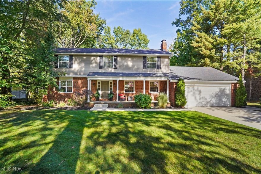 Welcome to this beautifully updated 4-bedroom, 2.5-bath Colonial located in Concord's desirable Brightwood neighborhood within the Mentor School District. This stylish home blends function and comfort both inside and out. Its gorgeous renovated first floor, beautiful front porch and backyard pool oasis are showstoppers! Step inside to find a welcoming floor plan with wood LVT throughout, highlighted by a gourmet updated kitchen featuring white cabinetry, subway tile backsplash, and an extra wide island with seats for 5 for those quick meals on the go. You will also find the coffee bar a nice enhancement to start your morning before heading out to the front porch or back patio. The kitchen flows seamlessly into the bright eat-in dining space with built ins and a sliding door leading to the deck, perfect for entertaining. The open-concept design continues into the family room, where a cozy gas FP with a full brick accent wall sets the tone for relaxed evenings. A versatile living room provides additional space and can double as a formal dining room if desired. Convenient everyday living is enhanced by the mudroom, complete with beadboard walls, built-in bench and hooks, plus access to the large laundry room, half bath, and garage. The garage features durable Nature Stone flooring, a workbench, and cabinets for organization. Upstairs, the spacious primary suite includes a walk-in closet, his/her sinks, and tile shower. Three additional bdrms and a full bath with double vanity complete the 2nd floor. The finished bsmt expands the living space with a home theater projector system, rec area, and ample storage. Mechanical updates include a high-efficiency hot water tank and dual-zone heating/cooling. Step outdoors to enjoy the ultimate backyard retreat. A concrete walkway and patio, expansive deck with pergola, a 27-ft round heated pool with bar seating and fire pit create the perfect setting for gatherings and relaxation. This meticulously updated home is move-in ready!