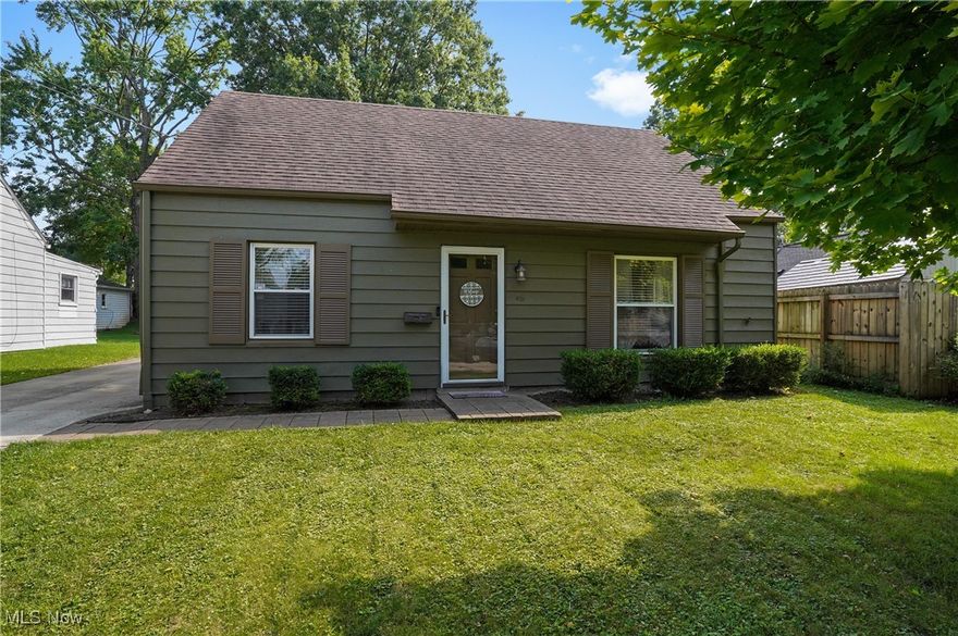 Welcome home to this charming Cape in the heart of Cuyahoga Falls. The living room is open to the kitchen and dining area. Kitchen offers refrigerator, stove/range, microwave, garbage disposal. Three season sunroom (new flooring 2024) is off of the kitchen and opens to fenced in backyard and offers a paver patio where you sit can out and enjoy or entertain. There are two bedrooms and bright, full bath (painted in 2023), with tub surround on the main floor. Upstairs you will find two more spacious bedrooms. Utility laundry room with washer and dryer. One car detached garage. New A/C (2024). Close to Front Street, shopping and restaurants and the Cuyahoga Valley National Park. Ready to move in!