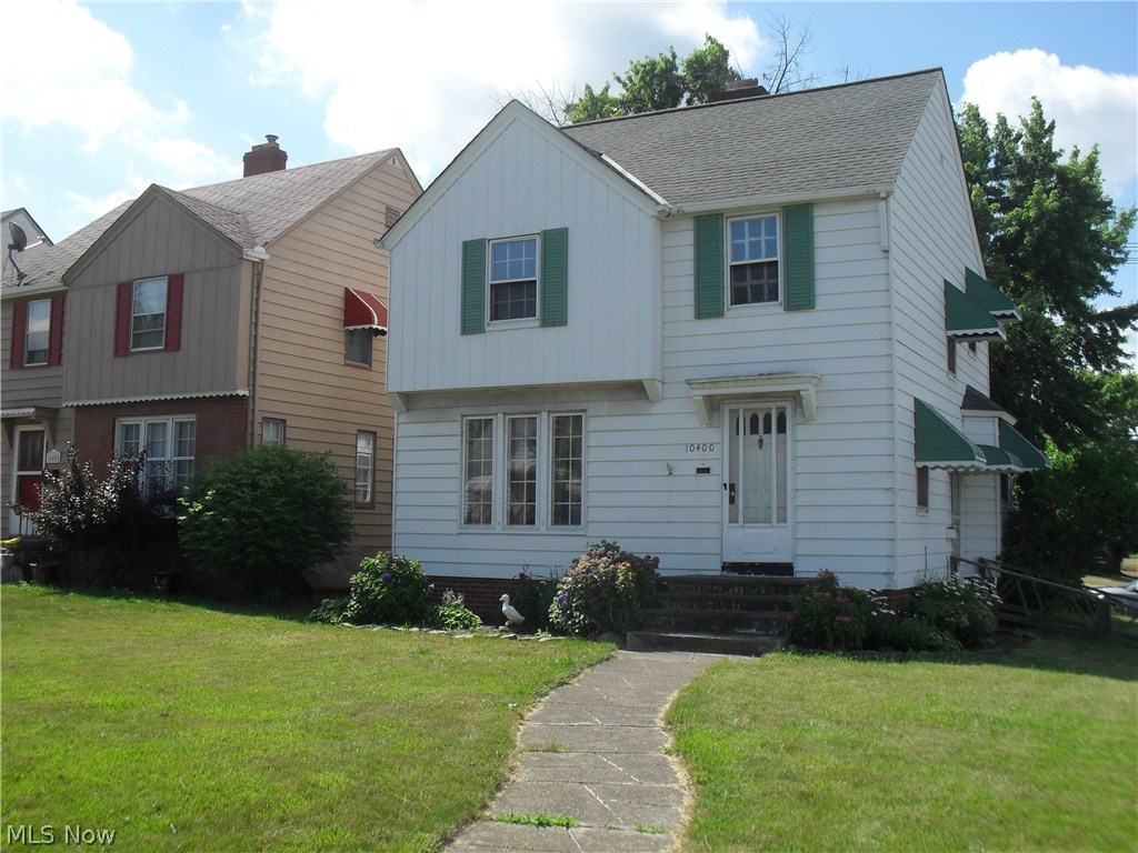 3 bedroom, 2 full baths Colonial with 1 1/2 detached garage. Full basement with full bath. Large living room with decorative fireplace and a formal dining room. Enclosed backyard with wood privacy fence. Updates (within 5 yrs.) includes kitchen counter, backsplash and accent wall (decorative brick), new wood veneer kitchen floor, refinished hardwood floors in living and dining rooms, updated tub surround and floor in main upstairs bathroom. Roof approx. 10 yrs. old.