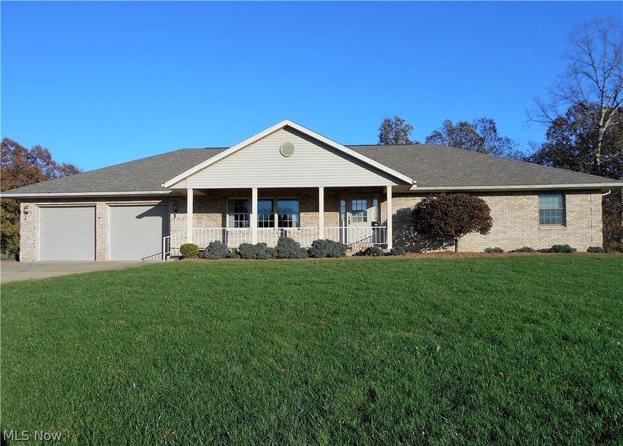 All brick, all 1st floor living, all freshly painted home, ready for new owners.  Situated on a 1.38 acre lot in an established neighborhood, this custom built, 3 bedroom, 3.5 bath home offers nice size rooms, and great open floor plan.  Spacious kitchen has ample oak cabinetry, Corian countertops, and all the appliances remain.  The master suite is 16x21 with 2 separate closets and large master bath with 2 vanities. The full, unfinished, walk-out basement offers endless possibilities of finsihable space or just great storage. Outdoor features include 8x26 front porch, 8x50 back deck, back patio, well-maintained landscaping, a 748 sq.ft. detached workshop with 2 garage doors, heat & electric.  Come see the pride of ownership in this lovingly cared for, move-in ready home.