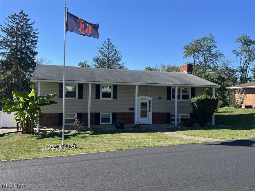 There's lots to like about this split-level/raised ranch on a quiet residential street offering the perfect blend of comfort, functionality, and space. Ideal for families of all sizes, this home's main level features three bedrooms and two bathrooms (including an en suite) and open concept with wood-beam ceiling. The kitchen/dining area adjoins the large living room with wood-burning fireplace. Downstairs is a family room complete with bar area and gas fireplace plus another full bathroom and laundry room leading to an oversized two-car garage with extra room for storage. Back upstairs, sliding doors from the dining area open to a covered back porch overlooking a generous lot with a fully fenced-in yard offering privacy and room for outdoor activities, pets, or entertaining. All appliances are included in the sale, and any mineral rights will convey to the new owners.