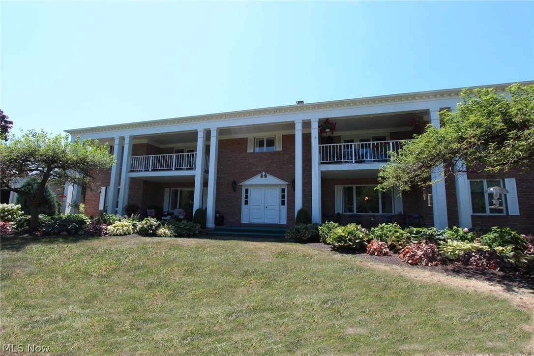 Stunning 2nd floor Condo overlooking Plumbrook Country Club- Tasteful Updated thru out. Incredible flowing floor plan. Eat in Kitchen with all appliances. A warm cozy Den with Gas fireplace and crown molding leads into the formal dining room and formal living room with amazing course views. A stunning rear balcony adds extra living space! 2 Car Garage with extra space for a golf cart. The laundry is in the unit and with additional storage and includes washer & dryer- Just move right in!