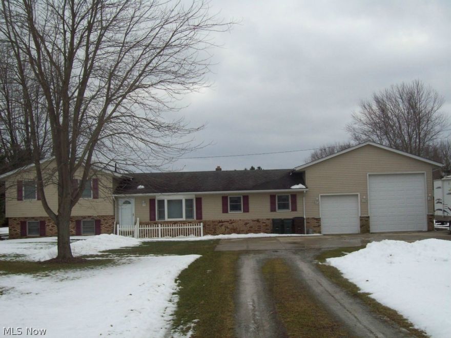 Wow great updated  2350 Sq ft split in the country on 2.32 acres . Home features a oversize attached heated garage that will fit  a R/v ,boat ,utility truck ect or serve as a great work shop.   The large  kitchen has custom oak cabinets with plenty of room to entertain. The living room has hardwood floors . There is plenty of room to spread out in the 25x19 great room along with a spacious family room and living room.Sliding doors open to the deck with beautiful views of the treed backyard and up ground swimming pool. This home shows like a new home and is a  must to see located in a great are on  a quiet road minutes to I -480 .