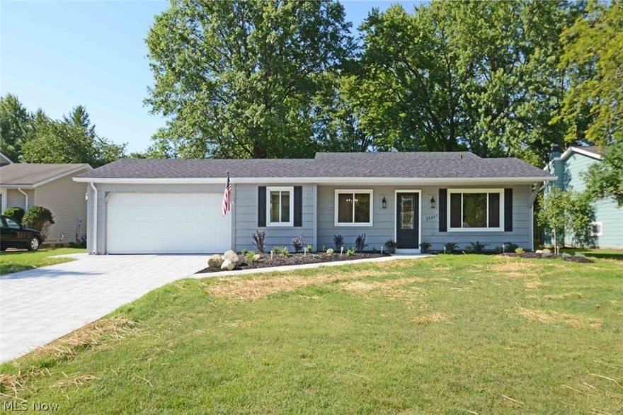“Flawless” New Reconstruction in Strongsville.  If you are looking for a Brand New  “Wow Factor” pull in to 20447 Homestead Park Dr. This home has been completely reconstructed from the bottom up using un paralleled craftsmanship and high end materials. Upon arrival you will notice a BRAND NEW (Driveway, Windows, Roof, Gutters, Patio, Shutters, Landscaping) Step in to a stunning home professionally designed by MyaMaxx. An Ultra-Modern Open Floor Plan featuring ALL NEW (Flooring, Carpet, Energy Efficient LED overhead lighting, and custom Plumbing Fixtures).The Eat-In Kitchen flaunts Custom Cabinetry accented by Granite Countertops, Stainless Steel Appliances, Breakfast Bar & Lg. Pantry.  The Lower Level Family Rm has old world exposed beams and a brick fireplace.  A Bedroom, Full Bath and Laundry make the downstairs its own living area. The second flr is highlighted by a stunning Full Bath that can be found in a Million Dollar Residence.  Three more bdrms with generous closets and moder