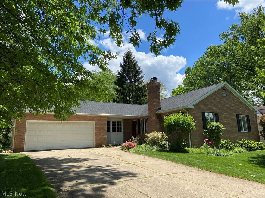 Gorgeous all brick ranch in the highly sought after neighborhood adjacent to Stan Hywet Hall. True one floor living at its best. Foyer entry with ceramic tile flooring. Living room features elegant french windows, wood burning fireplace with marble surround and built-in bookcases. Dining room off of the foyer has lovely views of the backyard gardens. Large kitchen with walk-in bay eating area and access to the 3 season sun room & patio. This is the ideal set up for outdoor entertaining. Flexible floor plan offers 2 master suites, or master suite and family/great/music room. Plus guest bedroom. 3 full baths on the first floor plus half bath in basement. Loads of closets & built-ins for ample storage. Gleaming hardwood floors throughout. This home has been meticulously maintained and is in spotless move in condition. New roof 2020. Truly a rare find in today's market.