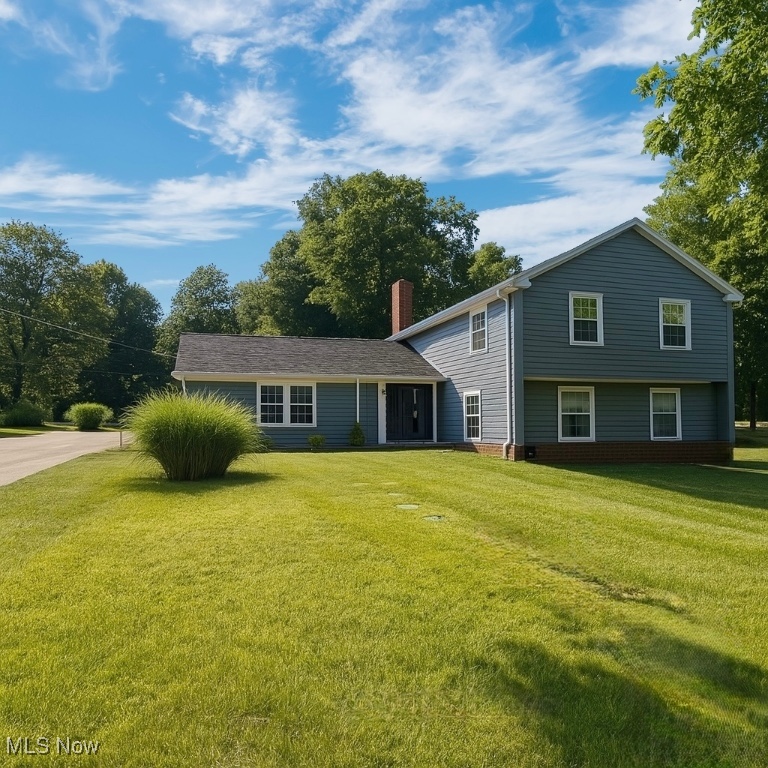 Amazing opportunity to own this professionally renovated dream home in the heart of Pepper Pike! Situated on over 1.5 acres, this stunning 4-bedroom, 2.5-bath home blends modern luxury with timeless elegance. Step inside the 2-story foyer featuring a luxurious chandelier and a beautifully stained wood staircase. The bright, light-filled living room offers comfort and style, while the formal dining room flows seamlessly into the chef's kitchen-complete with soft-close white cabinets, quartz countertops, and high-end stainless steel appliances (2023). Oversized windows and an open floor plan allow natural light to pour throughout the home, enhancing the spacious, airy feel. Enjoy cozy evenings in the spacious family room with a beautiful fireplace and access to the private patio. The main level also includes a dedicated office and a dramatic great room with a wet bar - perfect for entertaining. An updated half bath and laundry room complete the first floor. Gorgeous engineered hardwood flooring throughout (2023). Upstairs, the expansive primary suite features a spa-like en-suite bathroom with a free-standing tub, walk-in shower, double-sink vanity with LED mirror, and two walk-in closets with a custom California Closet system. Three additional bedrooms and a fully updated hall bath complete the second level. Extensive 2023 updates include: septic tank, vinyl windows, roof, AC & mini split system, light fixtures, insulation, concrete sidewalk, driveway sealcoating, and full interior/exterior painting. Enjoy recent added touches like custom Hunter Douglas window treatments, upgraded garage door track and height for larger vehicles, painted garage interior, stunning retaining wall with new landscaping and pine trees, and a beautiful pine tree-lined driveway. California closets in pantry, primary suite, and second bedroom. Tucked in a serene, private setting, yet minutes from award-winning Orange Schools, country clubs, shopping, dining, and major highways.