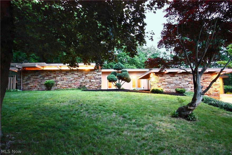 An amazingly sought after mid-century modern gem was designed and built as his primary residence in 1948 entirely of redwood by local architect Nader Hamed. Built for entertaining, the home features sliders to the outside from virtually every living space and is situated on a unique double lot in a parklike setting. Professionally landscaped twice, the property boasts many mature Azalia, Rhodedendrum, Dogwood, White Cherry, and Red Maples. Located on a dead end street off of Upper Merriman and nicely wooded view of the valley. Covered Back Deck that spans the length of the home. The Master Suite has its own full bath and a private Hot Tub Patio. The Master Bathroom has its own Tankless water heater along with a large tile shower. The Open Floor Plan includes a Double Sided Fireplace that faces the living room or the Great Room. Plus you have access to the back Deck and Back Patio of the Great Room. This home is set up for privacy and entertaining. There is an additional 1st floor Recro