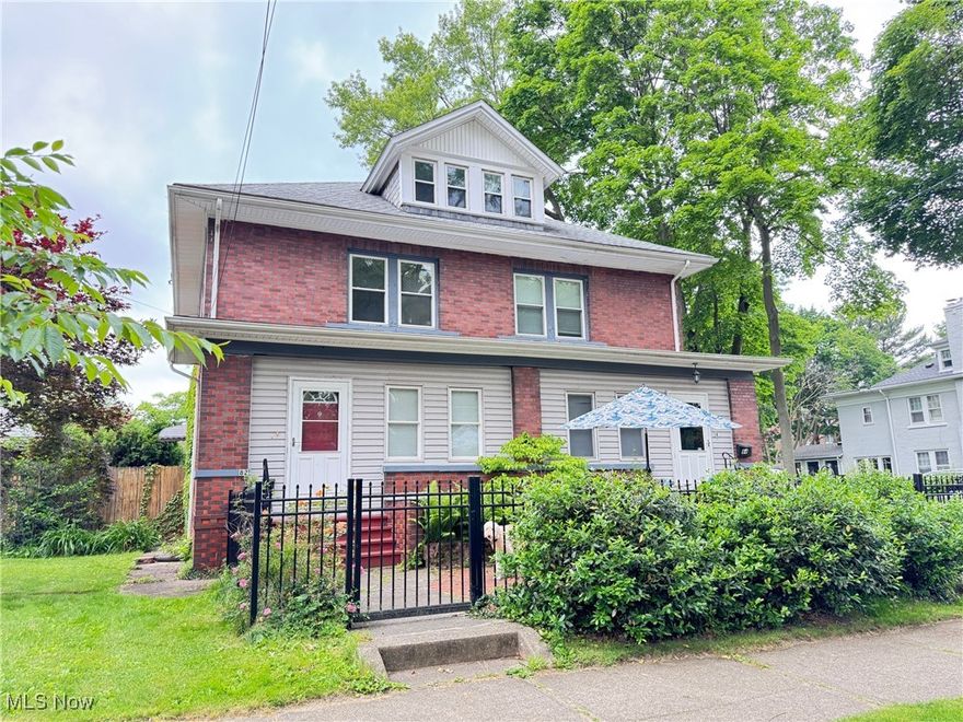 Amazing opportunity for live-in one unit and rent the other side. This is like two whole large houses with a common wall. Owner's unit (84) has more features like 3-season sun-room addition with private patio at rear, central air conditioning, newer kitchen,  and custom tiled bathroom with walk-in shower. Both front porches have been enclosed. Roof 2013, windows 2003, and newer furnaces in both units. Lovely shared brick patio with iron fence at the front. Each unit has an enclosed front porch, living room, dining room, kitchen and half bath on first floor. Second floor has 3 bedrooms and a full bath. Attics are the 4th bedrooms or bonus rooms. The 82 side was rented for many years and needs cosmetic updating like paint and carpet.