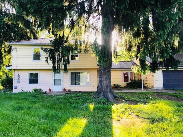 This 1866 square foot home has a great view and large backyard just in time for summer! This roomy 4 bedroom has a brand new metal roof and windows!
The first floor has a large living room and kitchen, bathroom, two bedrooms and a beautiful view of the Mahoning river. The second floor has 2 more large bedrooms. The attached garage with second floor storage and large wooded back yard makes this house perfect!