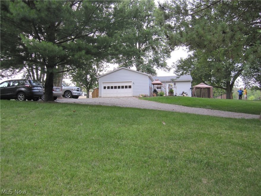 Move In Ready in the Norwayne School Disctrict.  Newly updated 3 yrs. ago this 3 bedroom, 1 bath, Ranch with an attached 2 car garage on .538 of an acre, has even more updates:  Less than a yr old - water softner, hot water tank, Well pump, Reverse Osmosis system, Pellott stove and wood burning stove together with 2 Amish built sheds. The newly fenced in back yard with a 12 foot gate, is also a nice addition. Enjoy the beautiful Hickory Kitchen that opens up into a large living area or relax and enjoy nature off the large 14 x 20 deck.  County living yet only minutes to I 71.  Don't hesitate, call today to set up a showing to see this very nice 3 bedroom, 1 bath home.