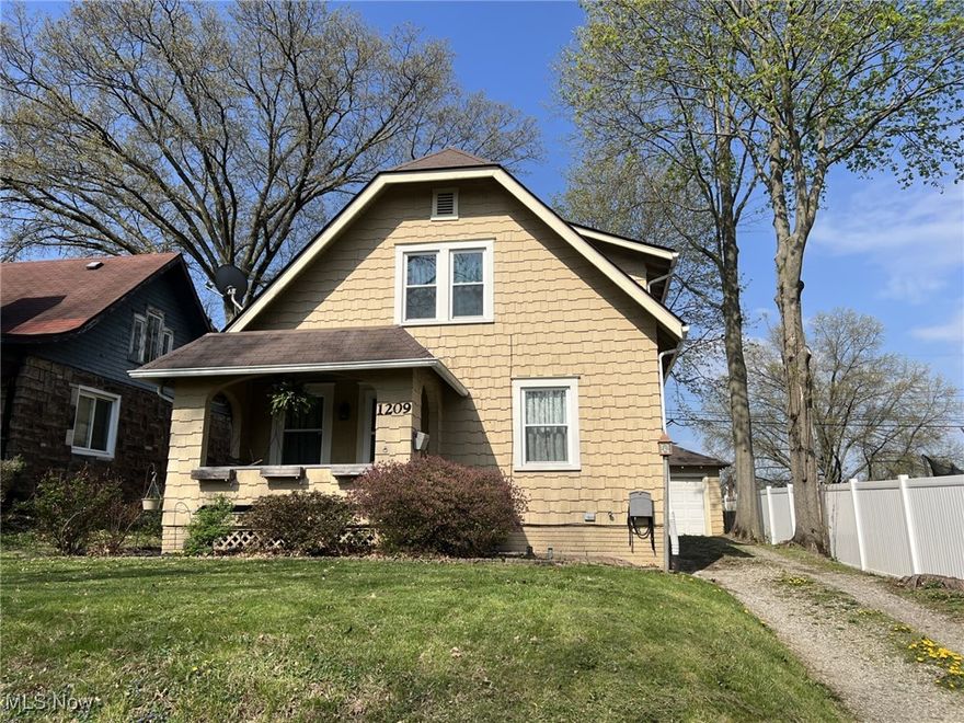 Cute, clean, and move-in ready describes this attractive 2 bedroom home!  The first floor offers beautiful hardwood floors, a large living room, spacious dining room, and an updated kitchen!  Upstairs you'll find 2 generous bedrooms, plenty of closet and storage space, and an updated bathroom with a ceramic tile surround shower!  The lower level offers additional storage as well as a bonus room perfect for office, play room, crafts etc.  Enjoy the outdoors on the swing under the covered, cozy front porch or relax or fire up the grill on the back yard concrete patio.  This one will not disappoint!  Convenient location.  Come take a look!