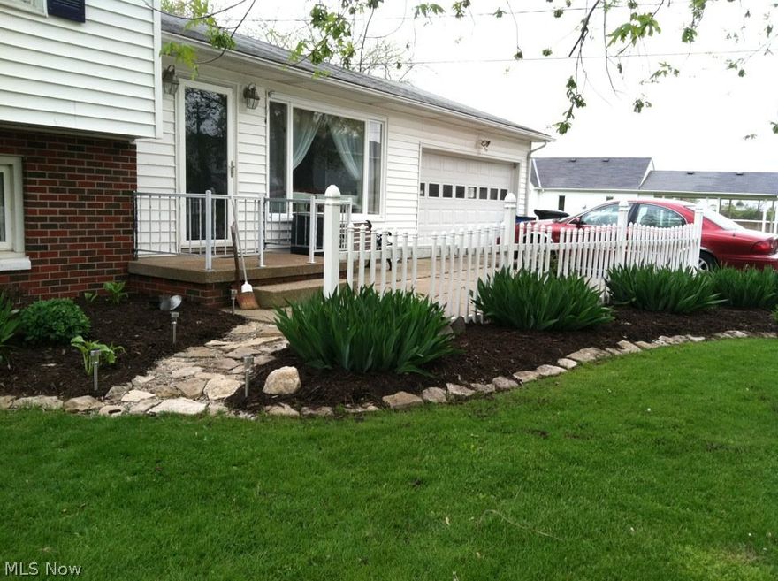 Waterfront, beach and dockage owned with sunset water.  4 BR, 2 full bath home.  2 car attached garage, multi-level, shed.  Beach theme indoors and out.  30' x 12' White sand beach in backyard. 12' x 20' wood dock.  Remodeled, many improvements.  Motivated Sellers.  Private woods behind. “One of only 2 residences in Bay View which own true water-touching land NOT belonging to the Property Owners Association”.