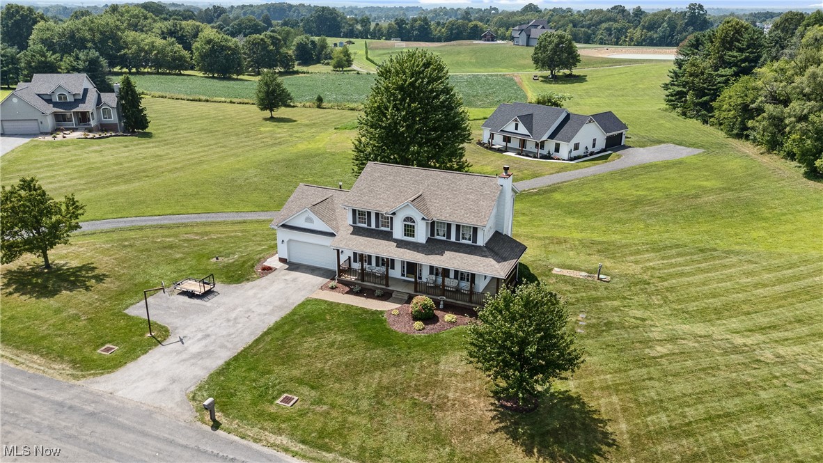Don't miss your chance to pick up this stunning Salem two story on a wonderful cul de sac just minutes from all the major routes! Situated on just under an acre lot the home offers over 2,700sf thanks to the finished walk-out basement which incorporates a rec-room, bar, and one of the four total bedrooms. The main floor is astonishingly open thanks to the combined living room, dinette and kitchen areas. A dedicated dining room just off the main foyer offers a wonderful gathering space as well. A half bath and laundry area near the two car garage offer functionality for owners and guests alike. Vinyl plank flooring, high ceilings, neutral colors, and gorgeous cosmetic upgrades are a common them through the main floor. Head upstairs through the two story foyer and you're first created with an amazing master suite. Cathedral ceilings, a walk in closet, and an oversized master bath make this an owners retreat like no other. Down the hall you'll find two additional well sized guest rooms with another shared full bath. Need more space still? Head to the finished walk out basement for some fun and possible fourth bedroom. The custom bar area and layout of the space make this an entertainers dream. This home has benefitted from loads of improvements recently, the septic, roof, and appliances are all within the last seven years and the cosmetics were addressed almost entirely in the last three. Call today to schedule your private tour!