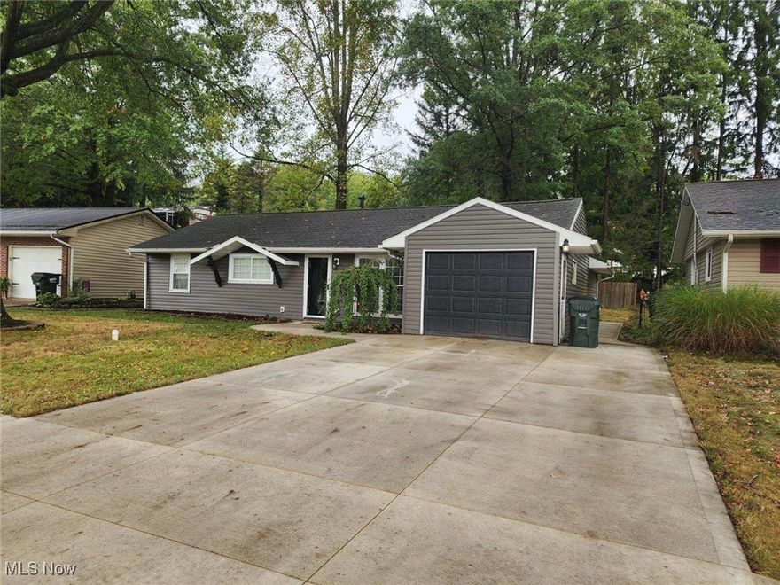 Newly remolded ranch with new furnace and air conditioning in 2023.  Newer siding and flooring in 2021. New concrete sidewalks and driveway in 2024.  Newer Kitchen.  New addition for master bathroom with walk-in shower and sauna.  Hot tub on back patio with pergola.  Second living room is a possible 4th bedroom.  TV in living room does not stay.