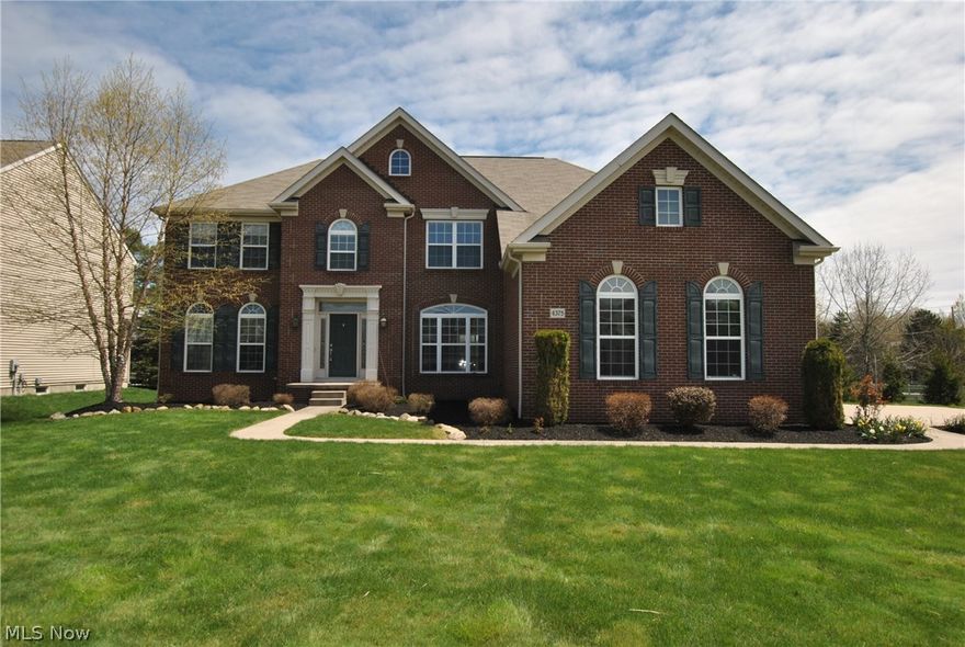 Stunning, one owner, custom built brick front colonial. Pride of ownership, shows like new. 5 bedrooms, 4 full bathrooms, open floor plan and 9 ft ceilings on 1st floor. Front custom staircase and back hallway staircase w/wood floors. First floor office or bedroom w/full bathroom. Living room w/crown molding. Beautiful dining room w/tray ceiling. Amazing 2-story great/family room with wall of custom windows, fireplace. Gorgeous kitchen w/custom raised paneled cabinets, granite counter tops, island, walk-in pantry, stainless appliances all stay, wood floor, sliding door to luxury maintenance free custom deck. 2nd Floor: 5 bedrooms. Large master suite w/glamour bathroom, walk-in closet. All windows w/custom blinds. Full basement, 10 ft deep w/full size windows, roughed in bath. Private lot is professionally landscaped. 3-car side load garage. Great Value, owner purchased in 2006 for $515,704. Don't miss out on this fine home. Shows like new! Prime location, near all conveniences. Award w