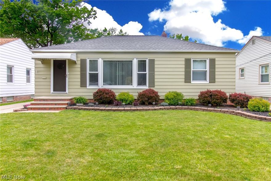 Stunning ranch home in move-in condition!  Remodeled kitchen featuring newer countertop, sink, and cabinets plus stove, dishwasher, microwave, freezer and refrigerator. Designer colors highlight the living room.  Spacious master bedroom with mounted flatscreen!  All bedrooms have hardwood floors and bedroom 2 also has carpeting.  Upscale finished Recreation Room with newer, neutral carpeting and fresh paint is highly desirable!  Newer furnace and central air has a transferable warranty.  Laundry Room includes washer and dryer.  Other amenities include 2 car oversized detached garage with opener, privacy white fence, nice backyard and patio.  One year home warranty included. Great Value!