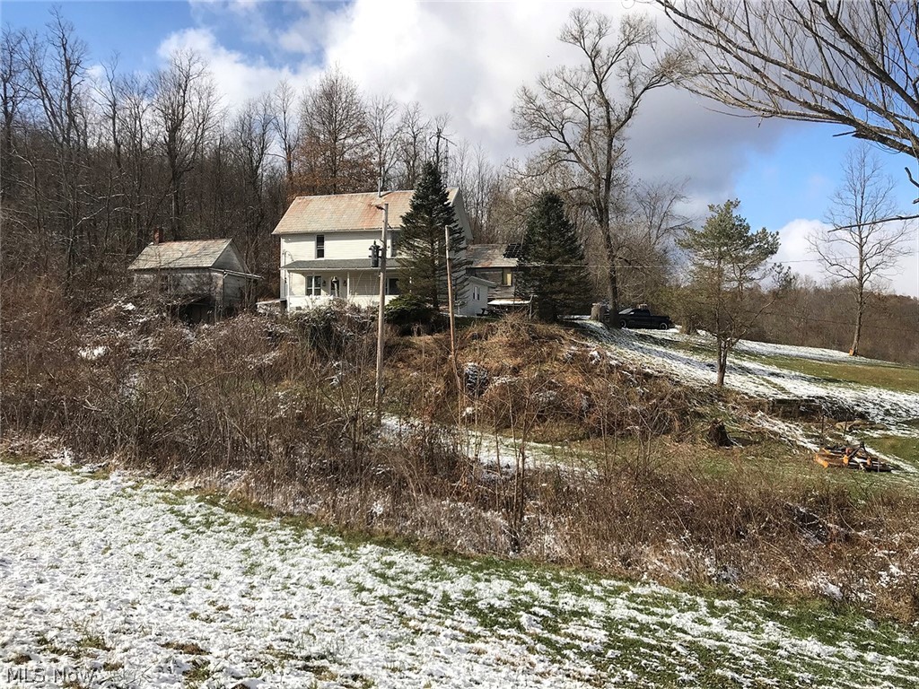 Attention Landowners – Outdoorsmen – Investors - Beautiful 54-Acre Homestead - 4-Bedroom Farmhouse – 2 Full Baths – Bank Barn – Storage Buildings - Mostly Wooded – Open Clearings – Tillable – 2,200' Road Frontage - Ideal Hunting Retreat Or Year-Round Home - Coshocton Co. – Bedford Twp. – Mineral Rights Transfer - Owners inherited property. ABSOLUTE AUCTION, all sells to the highest bidders on location: SATURDAY – DECEMBER 28, 2019 – 12:00 PM. REAL ESTATE: Parcel #0030000019500. 54.273 acres gently rolling land situated on a nice dead-end gravel road. Home has 1,984 SF and was built in 1890. The main level has a living room w/ fireplace, family room w/ fireplace, small bedroom, full bath, oak kitchen w/ dining area, and laundry room. The second level has an additional 3 bedrooms and a full bath. LP gas furnace with central air, nice Wood Master HD 4400 outdoor wood burner, drilled well, septic, vinyl siding, and some replacement windows. Nice large bank barn with lower level stalls, 30'