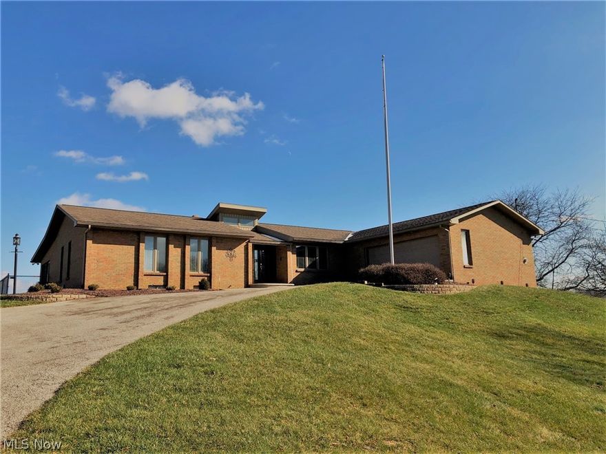 Beautiful, custom built, one owner home brick ranch - first time offered on the market.  Living and formal dining room offers wood floors, gas fireplace with built-in books shelves, bay window and entry to enclosed sunroom with dining room French doors leading to screened porch that is 15'x11'.  Screened porch takes you to fenced area for pets and wrap around deck with a stunning view. Screened porch also has entry to the sunroom, center of sunroom offers plumbing for hot tub with sunroom also offering entry to master bedroom; this room offers wall of windows of your scenic view.  Eat-in kitchen is spacious and offers an area for a table and sitting area for visiting or relaxing; we have laminate floors, Corian Countertops with under mount sink and second prep sink and desk area.  Laundry room is off the kitchen with built in closets and pantry area with lazy susan and exits to attached 2 car garage.  Master suite offers a jacuzzi tub, double closets with some cedar, access to enclosed