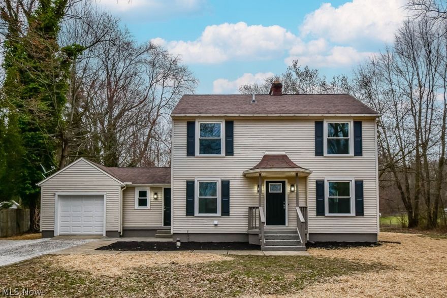 Your search for a new home ends here! This amazing three-bedroom, two-full-bath colonial has undergone a complete transformation including new windows, interior and exterior doors, a 93% efficient furnace and A/C with all ductwork, hot water tank, plus a brand-new septic system! Step inside to discover a freshly remodeled interior featuring vinyl plank flooring throughout the welcoming living room, complete with a wood-burning fireplace. The dream kitchen boasts quartz countertops, stainless steel appliances, a tile backsplash, and a dining area with a bayed wall of windows. Conveniently located on the first floor are a laundry room, an updated full bath and mudroom entry from the garage.  Upstairs, three nicely sized bedrooms with new carpet share another renovated full bath. The lower level rec room offers a second fireplace, perfect for cozy movie nights with friends and family. Outside, you'll find new gravel in the driveway and a new concrete patio, ideal for enjoying the spacious 1.15-acre lot. Don't miss out on this rare find – call today to schedule a viewing!