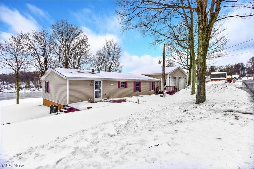 Awesome 3 Bedroom/2 Full Bath Home with BEAUTIFUL LAKE VIEWS of  Guilford Lake!  Home Features Include:  Large Living Room with Spectacular Views, Updated Kitchen with Oak Cabinets and laminate flooring, Formal Dining Room, Spacious Master Bedroom with Large Master Bath & Separate Vanity Area with an Amazing Walk In Closet, 2 other Large Bedrooms, 2nd Full Updated Bath with new shower insert, plus a First Floor Laundry Room.  Sit on your Massive 32 x 12 Front Deck with Peaceful Views Of Guilford Lake.  Updates Include:  New Windows - 2007, New Roof - 2007, New Garage - 2007, 200 Amp Electtrical, New Hot Water Tank - 2017. All this on a double lot. Come out and enjoy life on the lake.