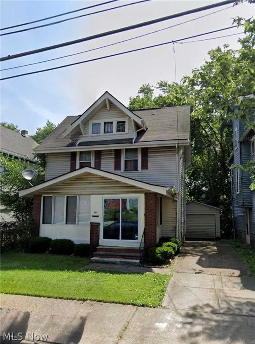 Welcome to 577 Rhodes Avenue! This traditional 3 bedroom 1.5 bathroom Colonial features classic character with timeless design. Located in an area experiencing continued growth and investment, the property is positioned near ongoing estimated $21 million dollar expansion of the Akron Zoo, bringing new energy and development to the neighborhood. The spacious traditional layout include an enclosed front porch/sun room-a great space to relax, read or enjoy morning coffee- a large kitchen equipped with refrigerator and stove, brick fireplace, and loft-style attic that could serve as an additional bedroom, home office, gym or recreation area. Freshly painted throughout, newer carpet in bedrooms, 1 car garage and fenced in backyard perfect for pets to roam and children to play— schedule your showing today! Potential investment opportunity- Market Rent: $1250-$1300 Cash on Cash ROI: approx 16% (solid cash flow)