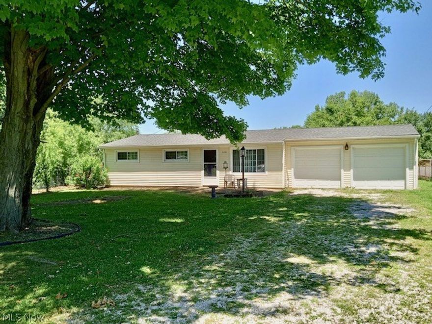 Beautiful mature trees grace the front of this Desirable 3 bedroom home nicely located in Shalersville Twp. This light and airy home features a beamed cathedral ceiling in the living room and a 4 season room off the kitchen as well as a spacious attached 2 car garage with 220 electric hookup and dual garage door openers.  The yard features mature trees that provide beautiful shade as well as beautiful flowering trees and shrubs and a large vinyl sided shed in the fenced back yard.  Crestwood Schools. 
Extensive work has been done on the mechanicals of the home.  
The list includes:
Fresh paint throughout. 
New whole home insulation. (blown in cellulose in walls)
New high efficiency gas hot water tank.  
New high efficiency Carrier furnace, 
Sunroom remodeled 2023 with the Floor resealed and walls insulated. 
Attic access in hallway with fold down stairs. 
Roof & gutter system replaced 2016.  
Water softener with reverse osmosis under sink in kitchen (2016).  
Electric updated 2016 with new panel and box. 
Energy efficient double pane Windows were replaced in 2016