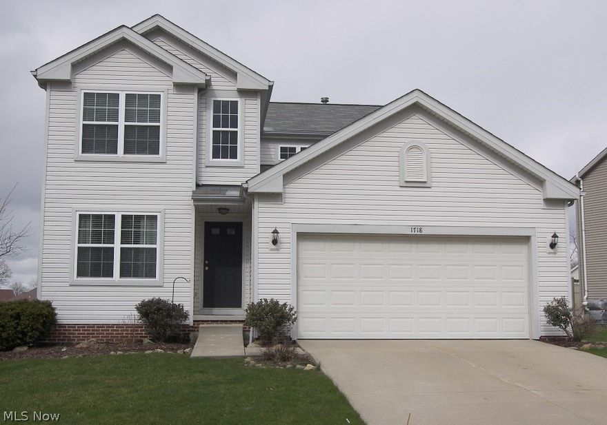 Beautifully updated in today’s style and colors and ready for you to move right in and enjoy.  As you walk into the foyer, there is an office/den for quiet times.  This open floor plan presents a great room with a gas fireplace, wood laminate flooring and great windows affording lots of natural light.  The kitchen is awesome and updated (2016) with newer white cabinets, stainless appliances, a center island with a breakfast bar, wood laminate flooring and an eating area with sliding doors to the stamped concrete patio and open backyard.   All bedrooms and two full baths are on the second floor with the master suite featuring a walk in closet and glamour bath to include double sinks, a separate shower and tub.  There is a full basement ready for your finishing touches as well as good storage space.  Other features include a first floor laundry room and two car garage.  Don’t miss seeing this ready to move in house.