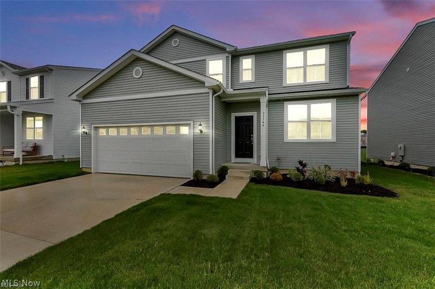 Built in 2024 by Pulte Homes of Ohio LLC and located in the desirable Emerald Woods subdivision, this stunning colonial offers 2,298 sq ft of beautifully designed living space with an attached 2 car garage 3 bedrooms, 2.5 baths, a loft, full basement, and an ideal layout tailored for modern family living with comfort, space, and style.

The inviting open floor plan is filled with natural light and showcases a spacious living room with a built-in electric fireplace and large ceiling fan, seamlessly flowing into the dining area and kitchen—complete with a center island, breakfast bar, pantry, and all included major appliances (range, refrigerator, microwave, dishwasher, and washer), making this home truly move-in ready and perfect for entertaining and everyday living.

Upstairs, all bedrooms are thoughtfully located along with a convenient second-floor laundry room with a sink and an additional sitting area/bonus space, while the luxurious primary suite features a remarkable 17x6 walk-in closet and a spa-like double vanity bath that elevates the home with a true sense of high-end comfort.

The main level offers wood flooring throughout with carpeting in all bedrooms, along with high ceilings and multiple walk-in closets enhancing the home’s spacious feel. The full unfinished basement provides an incredible opportunity to customize and expand your living space to fit your needs.

Outside, unwind on the patio, admire the beautifully maintained landscaping with irrigation/sprinkler system, or take advantage of neighborhood amenities included in the low annual HOA fee. Situated in the Emerald Woods HOA community, this home blends thoughtful design, quality craftsmanship, and family-friendly living in a highly desirable newer build setting.
