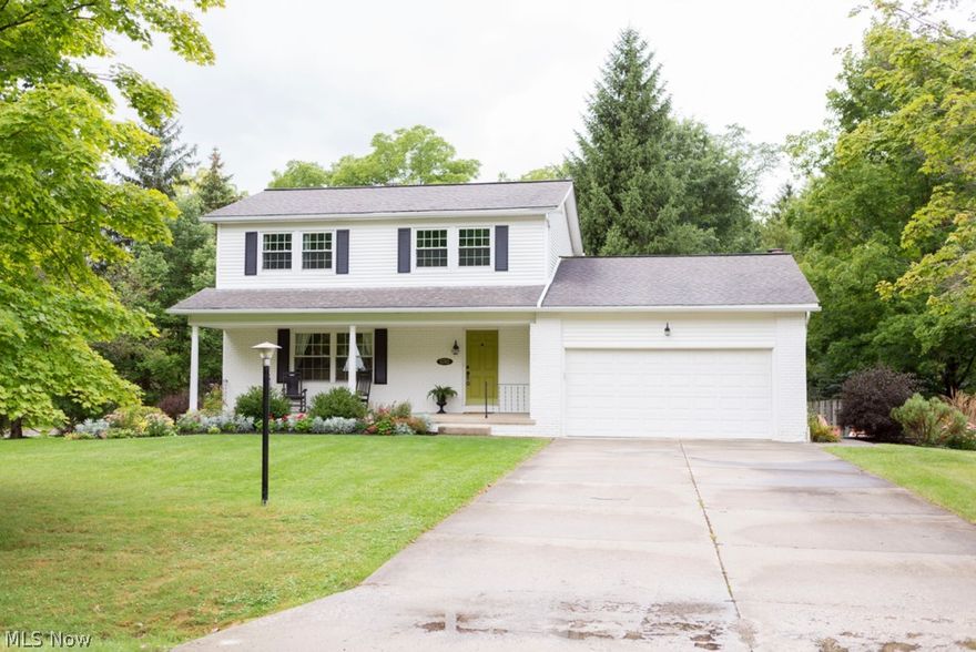 Fabulous corner lot for this completely updated 4 bedroom, 1.5 bath home. You will love the hard wood floors throughout the first level and the outdoor entertaining space with the new deck and custom patio. The eat in kitchen boasts beautiful cabinets with granite counter tops. Upstairs is the completely updated full bathroom. Each of the bedrooms has ample closet space and plenty of room to unwind. The finished basement is an added bonus with great attention to detail for quality craftsmanship. This home includes a home warranty and is updated with new siding ('09), windows ('09), water softening system ('09), all flooring ('09), upstairs laundry hookup ('09), AC ('10), all new fixtures and a new concrete garage floor. Call today to schedule your private showing. This home won't last long!