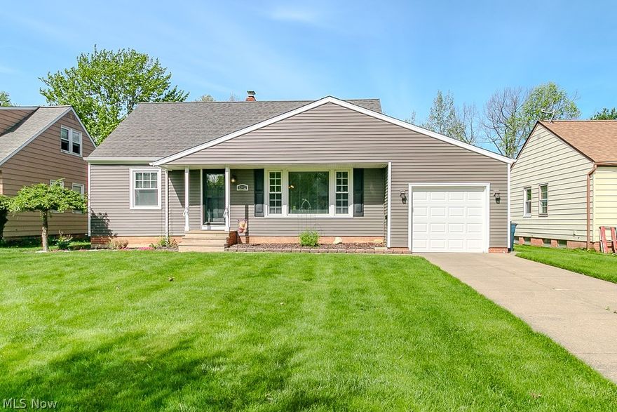 Beautifully maintained bungalow with thoughtful updates throughout! Step inside to a spacious living room filled with natural light from the large picture window and enhanced by recently refinished hardwood floors. The adjoining dining room flows into the updated kitchen, featuring beautiful cabinetry, granite countertops, a new subway tile backsplash, and stainless steel appliances that stay. Just off the dining room, enjoy the attached enclosed patio/sunroom with new windows, creating a cozy bonus space to relax or entertain.
The main level offers two nicely sized bedrooms with gleaming hardwood floors and new closet doors, along with a recently updated full bath showcasing dual sinks and a gorgeous walk-in shower with a custom glass door. Upstairs, the expansive primary bedroom provides a private retreat with a large walk-in closet and an attractive barn door for added charm.
The partially finished lower level adds even more usable space, including a full bathroom, extra storage room with a stand-up freezer that stays, and a charming laundry area complete with a folding station. Outside, enjoy great curb appeal, a fenced backyard, concrete patio, raised fenced-in garden, and attached one-car garage.
Major updates include whole-house blown-in insulation in 2025, new garage door and opener in 2025, new garage floor in 2026, sunroom roof in 2024, front storm door in 2025, siding and gutters in 2016, HVAC in 2014, house roof in 2008, HWT in 2011, plus updated windows. A warm, inviting home with space, character, and updates you’ll appreciate!