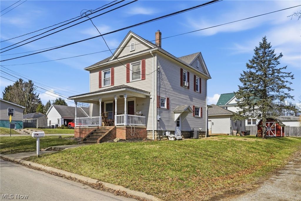 Photo of 207 Harmon Avenue NE, Brewster, OH 44613 (MLS # 5190607)