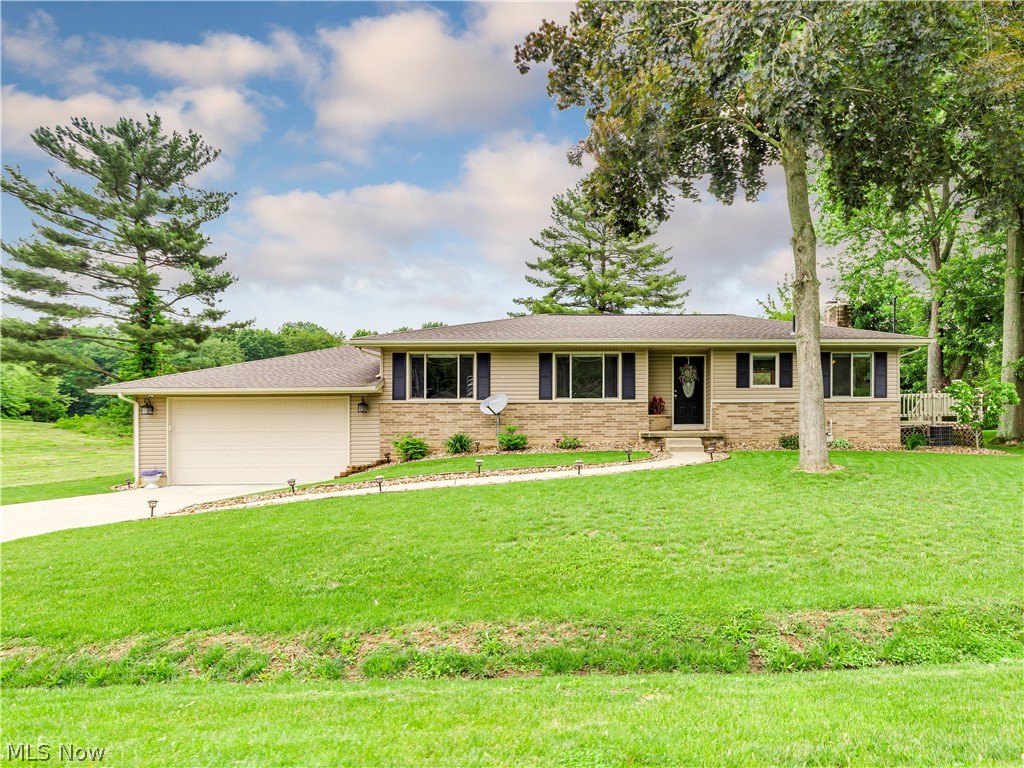 Welcome home to this beautifully updated home located on a lake in Uniontown with Green LSD. The great room features a living area with expansive picture window overlooking the backyard and lake. The kitchen has quartz counters, bar seating, stainless appliances and a dining area. The master bedroom boasts an amazing 10x13 walk in closet with closet system that can easily be turned into bedroom #3.The second bedroom is nice sized and has a large closet. There is a first floor full bath with granite counters and tub/shower. The lower level has two separate spaces. One has a fireplace and access to the beautiful back patio overlooking the lake. The other one is perfect for movie night and entertaining. A full bath and plenty of storage completes the lower level. This home has been beautifully renovated and is waiting for you to call it your home. You are close shopping, schools, restaurants, parks and the interstate. Do not miss this opportunity! Call today for your own private showing.