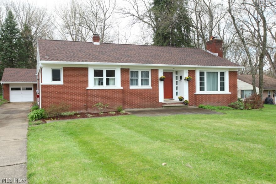 Outstanding quality throughout all brick 3 bedroom 1 1/2 bath updated convenient ranch home you've been waiting for...it shines from the outside in...great open floor plan that features an exceptional modern rich maple kitchen fully equipped with stainless steel appliances...updated bath with maple vanity and ceramic tile...beautiful easy care wood flooring in dining room, living room, and spacious bedrooms...cut stone fireplace...huge basement with kitchen cabinets and stove area...washer/dryer...newer roof and windows...2-10 home warranty. Residence reflects pride of ownership. This solid built brick beauty is turn-key and waiting for you. It's a real gem.