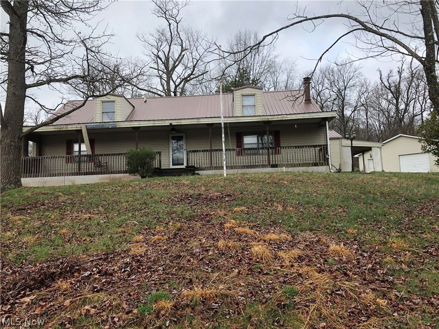 Home situated on 6.45 acres just outside Belpre on Mill Branch Rd. Home office, 3 bedrooms, 2 baths, large eat-in kitchen and family room, living room and fireplaces finished room on upper floor, another can easily be finished. Large covered front porch, yard, private. Detached double garage.