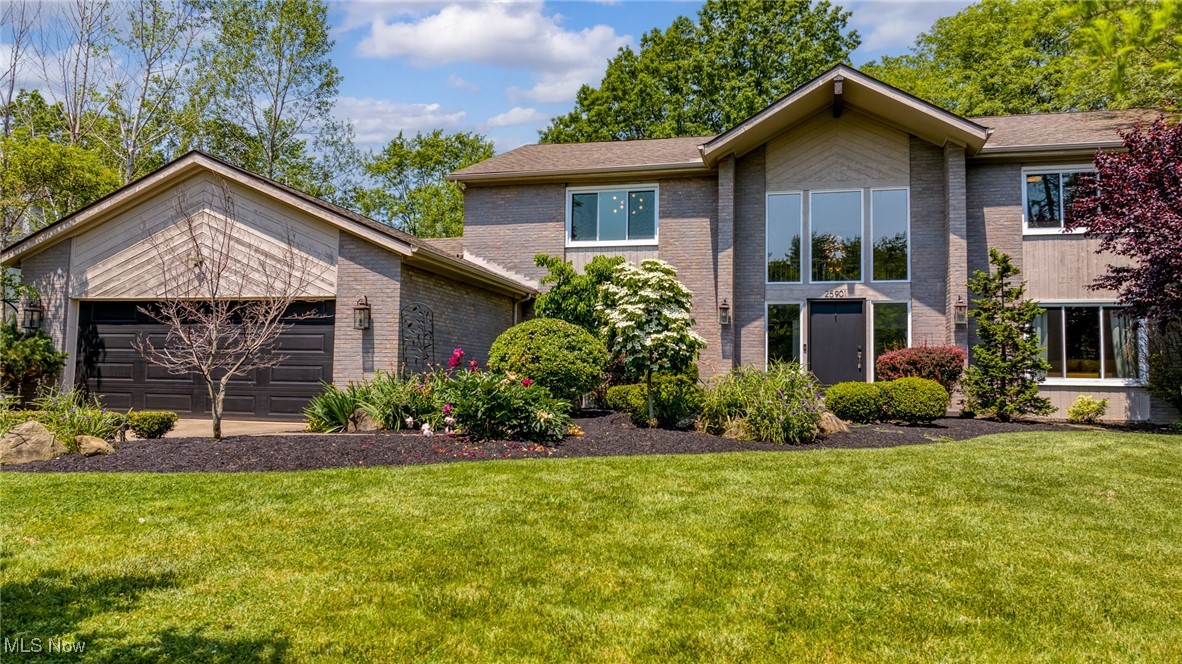 This one-of-a-kind 6-bedroom, 5-bathroom colonial offers over 6,000 sq ft of updated living space on one of the largest, fully fenced backyards in Beachwood. The beautifully landscaped yard features expansive decking, stamped concrete paths, a gazebo, fire pit, and plenty of green space for entertaining or relaxing. Inside, a grand two-story foyer leads to an elegant dining room and sun-filled living areas with newer hardwood floors. The chef’s kitchen includes Aspen shaker cabinetry, a massive island, professional-grade appliances, walk-in pantry, and built-in workstation. The soaring family room with its two-story stone fireplace and floor-to-ceiling windows brings the outside in. A first-floor bedroom with en-suite, guest bath, and mudroom/laundry area offer practical living. Upstairs, the primary suite boasts vaulted ceilings, dual walk-in closets, and a spa-like bath. Three additional bedrooms share a full bath with separate vanities. The finished lower level includes a full guest suite with kitchen, gym, and entertainment space. Located walking distance to Beachwood Middle and High School and minutes from restaurants and shopping. Recently updated windows and exterior paint complete this special home in a prime location.