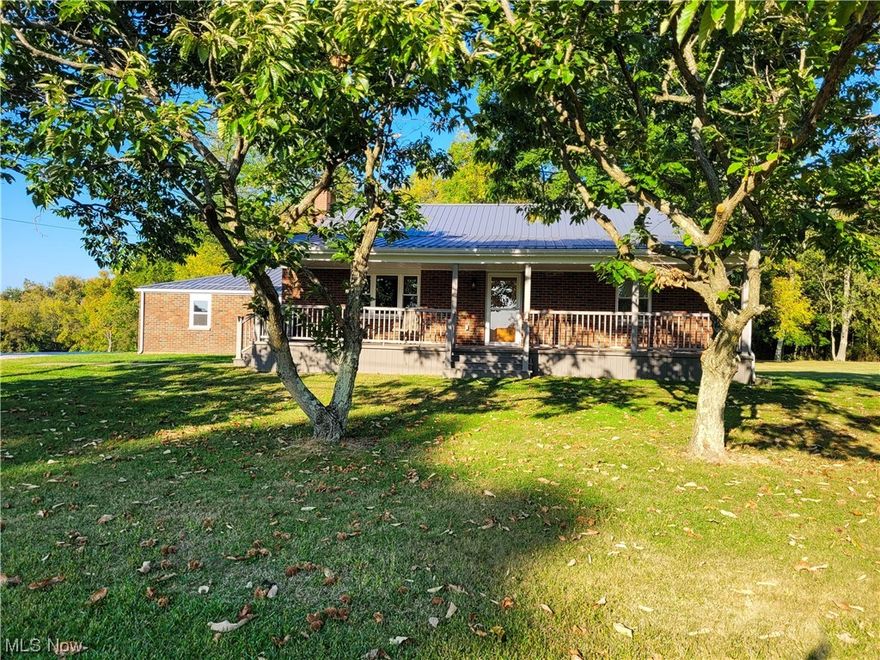 Welcome to this remarkable home located in the outskirts of Smithfield, OH. This newly remodeled home features 4 bedrooms and 2 full bathrooms. Even though this home was built in 1962, there is nothing that hasn't been replaced. Once you step into this beautiful home, you will be welcomed by the updated kitchen that includes granite countertops and modern high-end new stainless steel appliances. All materials are high end installed. In the living room, you will find a custom built in oak wood fireplace mantle with shelves that has a cheery rough cut top. The full basement has a newly installed foundation support system with French drains and a sump pump. This home features first floor laundry in the master bedroom. This property offers a harmonious blend of comfortable living, natural beauty, and modern convince with a generous driveway with plenty of parking. Don't miss this opportunity to make this house your home! ***Seller is willing to do seller financing***