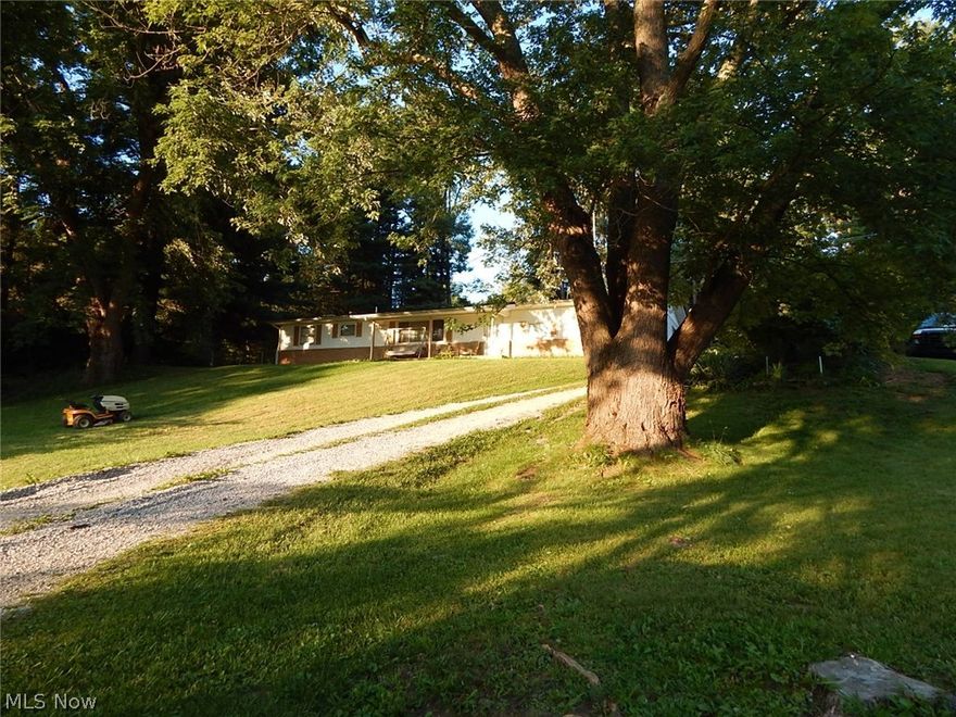Nice ranch home with spacious rooms, family room with propane fireplace, large living room and plenty of cabinets and counter space in the kitchen.  Relax on the front porch and watch the sun set.  The over sized garage has plenty of room for 2 cars  plus an additional 2 rooms would be perfect for a craft room or man cave.  The garage also has newer insulated garage doors, cement floors, wall board, plenty of built in shelving and an abundance of electrical outlets.  The rear patio is perfect for entertaining and the roof was replaced in 2015 and has a 25 year transferable warranty.  Home is currently rented.  Located in the Beautiful Hocking Hills, this property is close to Old Man's Cave, State Parks, R-Adventure Park and Lake Logan.