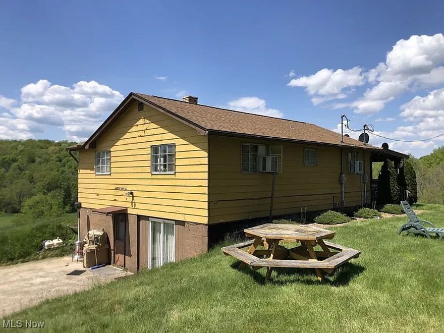 Beautiful property and country living at its best. This 3 Bedroom 2 Bath home (with separate apartment downstairs) features a custom walk around deck and an attractive newer 48 X 32 outbuilding.

This versatile one-of-a-kind property could be used as a residence, hunting camp or investment income property or a combination of all three. Several scenic views to enjoy with this elevated property sitting on 9.5 acres. This well maintained property has been privately owned for nearly 30 years with a clean title.

All furnishings and property tractor stay, so you can move right in.