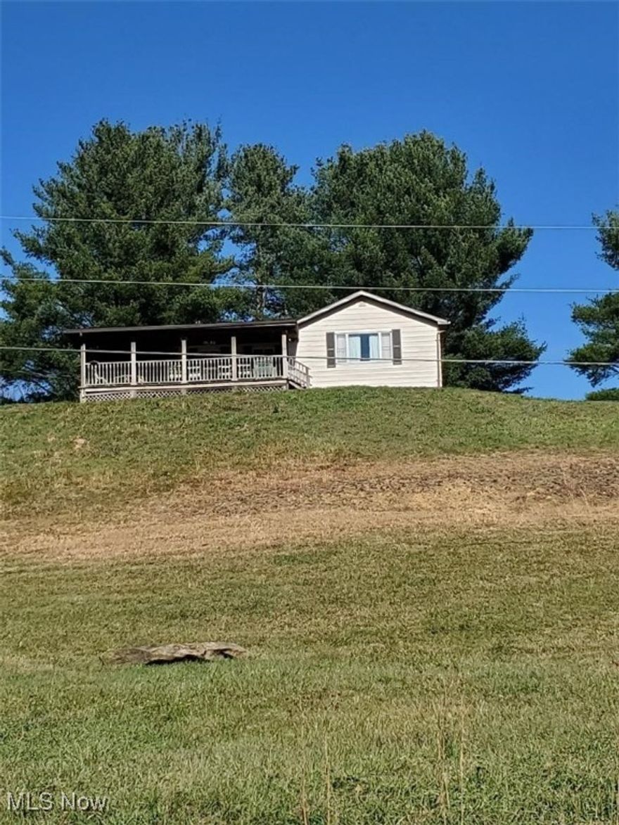 Beautiful property and country living at its best. This 3 Bedroom 2 Bath home (with separate apartment downstairs) features a custom walk around deck and an attractive newer 48 X 32 outbuilding.

This versatile one-of-a-kind property could be used as a residence, hunting camp or investment income property or a combination of all three. Several scenic views to enjoy with this elevated property sitting on 9.5 acres. This well maintained property has been privately owned for nearly 30 years with a clean title.

All furnishings and property tractor stay, so you can move right in.