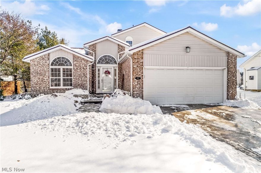 This recently renovated home, just minutes from Historic Downtown Medina Square, is a showstopper! Situated perfectly on a cul-de-sac in a wonderful and inviting community, this 3-bedroom split level has the kitchen, living areas, master bedroom and laundry on the first floor.

Upon entering you’ll notice the high-quality materials and craftsmanship like the reclaimed slate flooring (from the roof of old barns) in the foyer, authentic reclaimed barnwood beam flooring, the reclaimed hand-split sandstone fireplace, and the whitewashed wood planked ceiling in the dining area and sunroom.

The kitchen boasts custom Amish built glazed cabinetry, exquisite high end custom lighting from reclaimed lumber, a full width stainless steel farmhouse sink, granite countertops, and a French 4-door stainless steel refrigerator.

There is abundant natural light throughout with the large windows and cathedral ceilings. The master bedroom features its own ensuite full bathroom with double closets.
