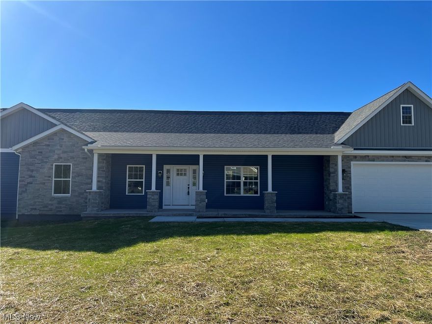 This stunning new construction home is situated on a sprawling acre of flat land in a beautiful development. With 4 bedrooms and 3.5 baths, there's plenty of room for your family to grow and thrive. The stone fireplace adds the perfect touch of warmth and charm to this already beautiful home. The finished basement provides even more space for entertaining or simply relaxing. Enjoy the outdoors on your composite deck or the concrete front porch. And with an oversized 24 x 32 garage, you'll have plenty of room for all your vehicles and toys. Additionally, there is a 2nd garage in the basement for storage and your mower. This home is also wired for a generator. Don't miss out on the opportunity to make this your dream home! (1 year home warranty from Home Warranty Inc)