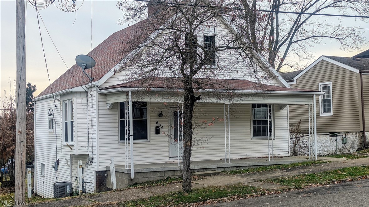 MARTINS FERRY!! WELCOME to 604 Vine Street. VERY AFFORDABLE!! This Cape Cod style home has been completely remodeled/updated and is MOVE IN READY!! 3 bed, 2 bath, front and rear covered porch, nice back yard with parking area, and a full unfinished basement. The eat-in kitchen offers GORGEOUS modern white cabinetry, plenty of counter space and a BEAUTIFUL back splash. The SPACIOUS living room offers a comfortable atmosphere. There is a bathroom on both the main and second level. Conveniently located near OH Rt. 7. CALL TODAY!