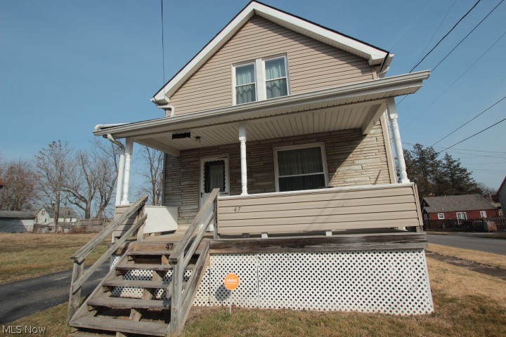 Cozy 3 bedroom 1 bath located on Youngstown's west side. Features include a porch, fenced backyard, newer roof, newer windows, vinyl siding. 1 car detached garage.