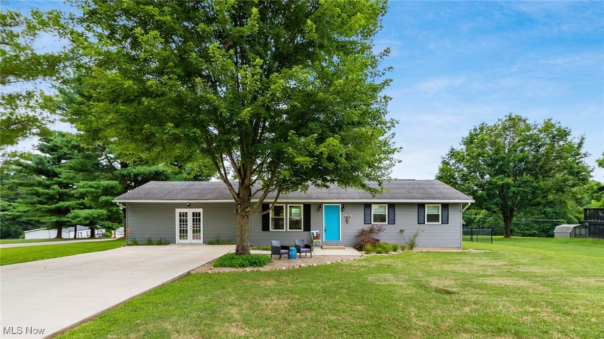 Welcome home to effortless living in this inviting 3-bedroom, 2-bath ranch in the East Muskingum School District. Thoughtfully designed for comfort and convenience, the layout includes a private primary suite with its own full bath—an ideal retreat to unwind and recharge. The updated kitchen features sleek stainless-steel appliances and flows seamlessly into casual dining, perfect for your morning coffee or weekend pancake tradition.
You'll appreciate the ease of first-floor laundry and the flexibility of both a living room and a separate family room—offering plenty of space to relax, entertain, or spread out. Step outside to a flat, fenced-in backyard that's ready for summer memories, complete with a play set, handy storage shed, and a spacious deck built for cookouts and evening gatherings.
A concrete driveway and crisp curb appeal make a welcoming first impression, while the convenient location near the interstate puts shopping, schools, and daily essentials within easy reach.